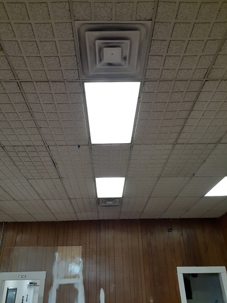 Ceiling before refresh of Veterans Center of Citrus Heights (CA), sagging, lighting